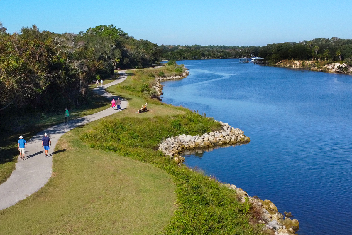 People walking the path at Waterfront Park, Palm Coast